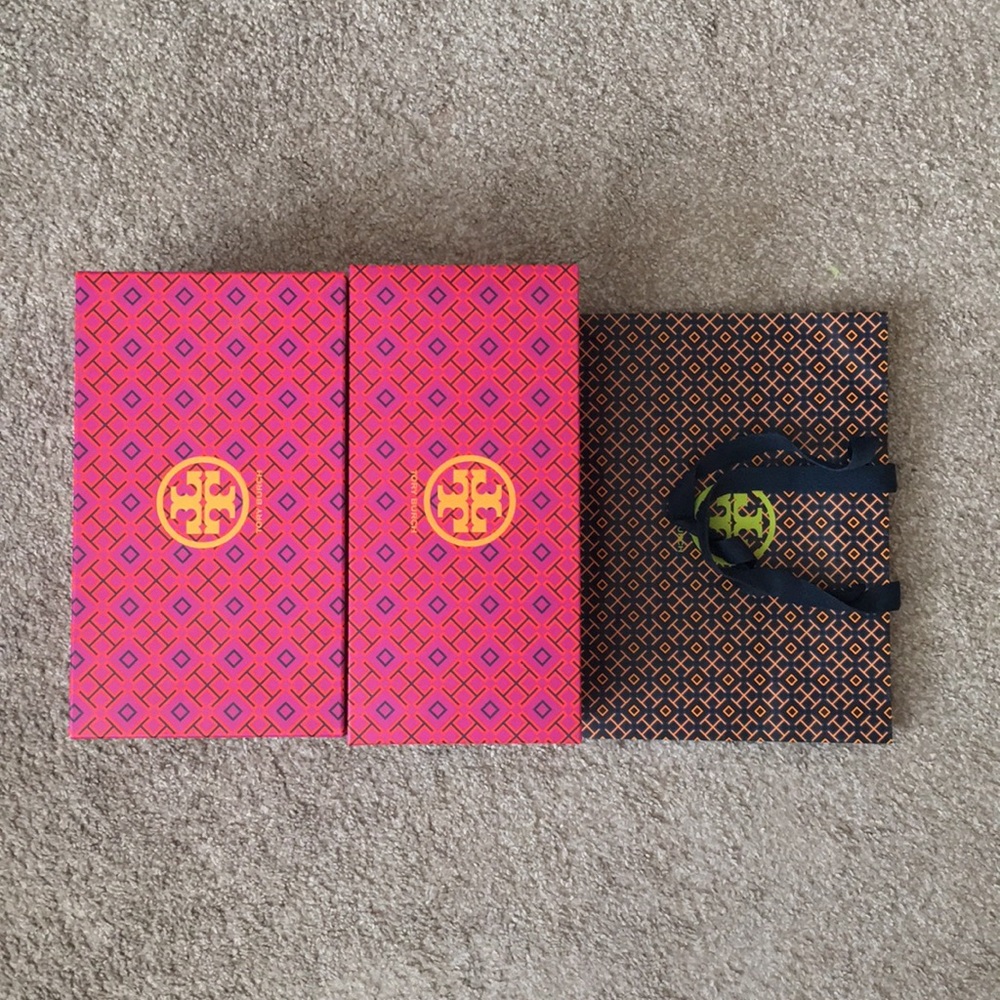 Bundle of Tory Burch boxes and shopping bag